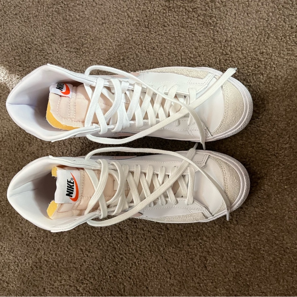 Selling white & pink Nike Blazers size 8 1/2. Worn 2-3 times.